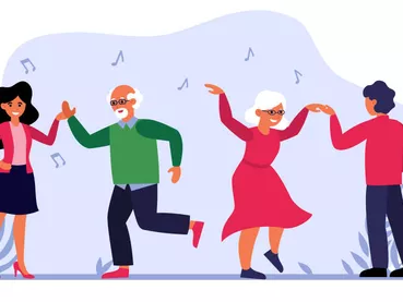 Senior couple dancing with young people